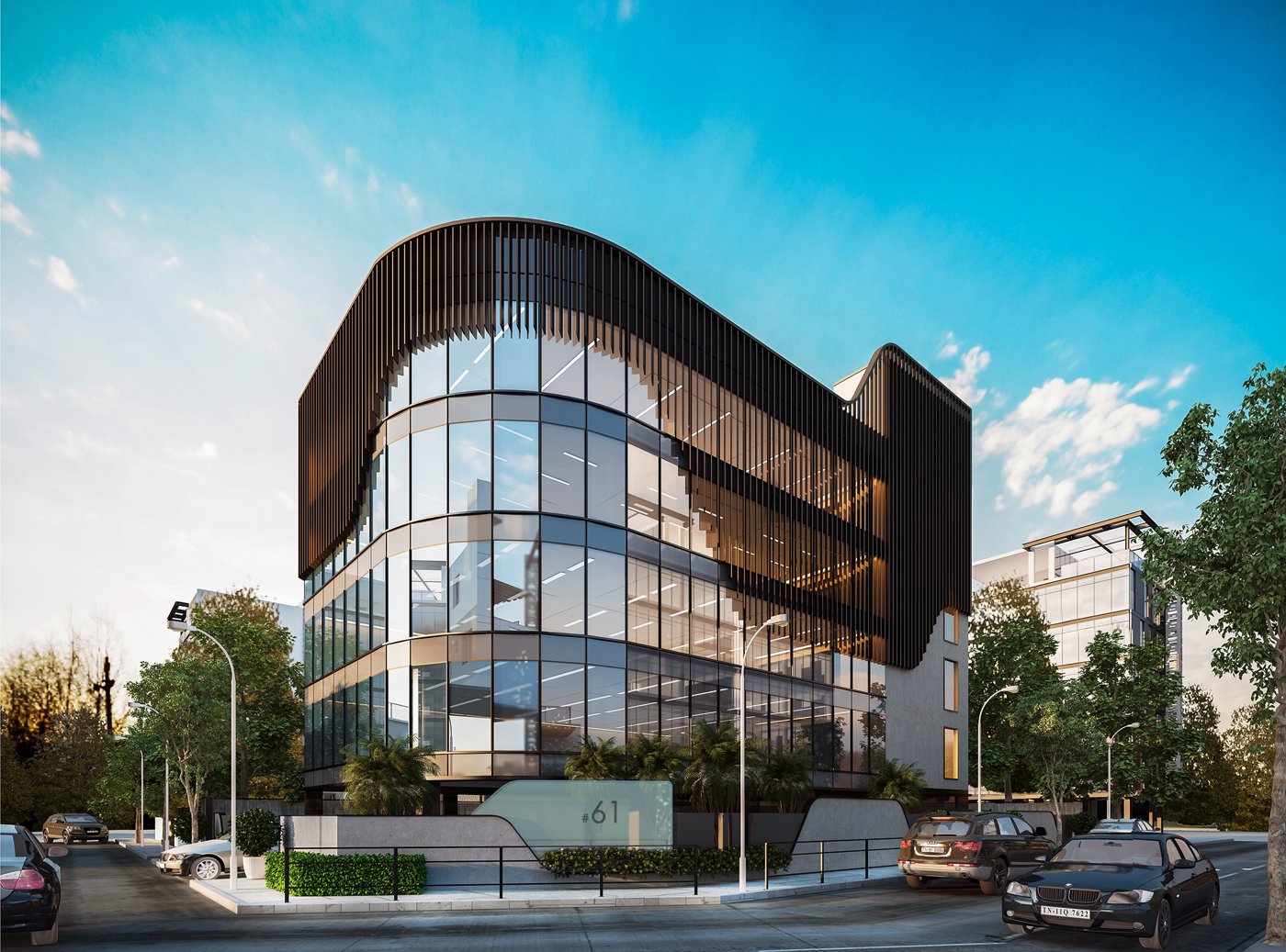 Curved contemporary retail building with a glazed base
