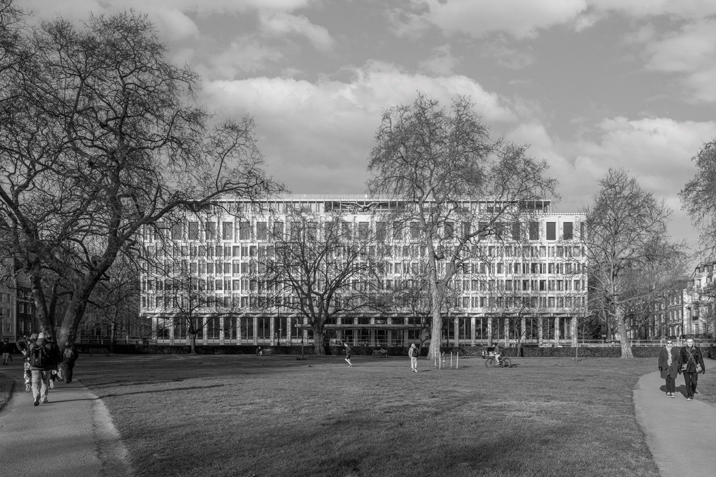 The retained façade addresses the square