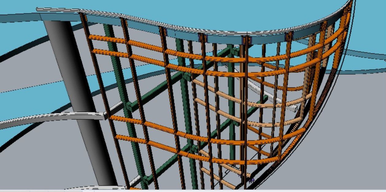 Steel lattice behind curtainwall