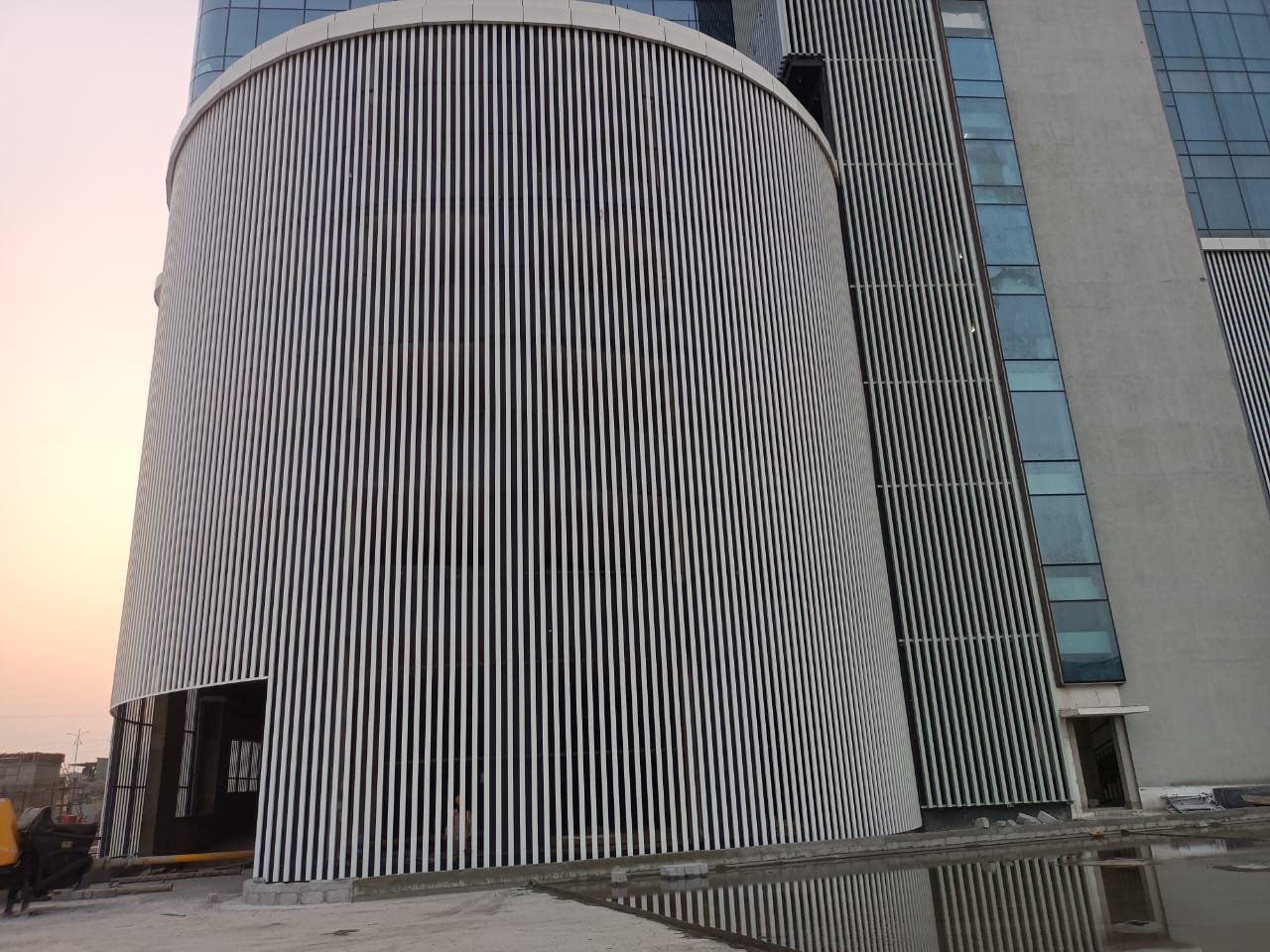Tower clad in tapering vertical fins