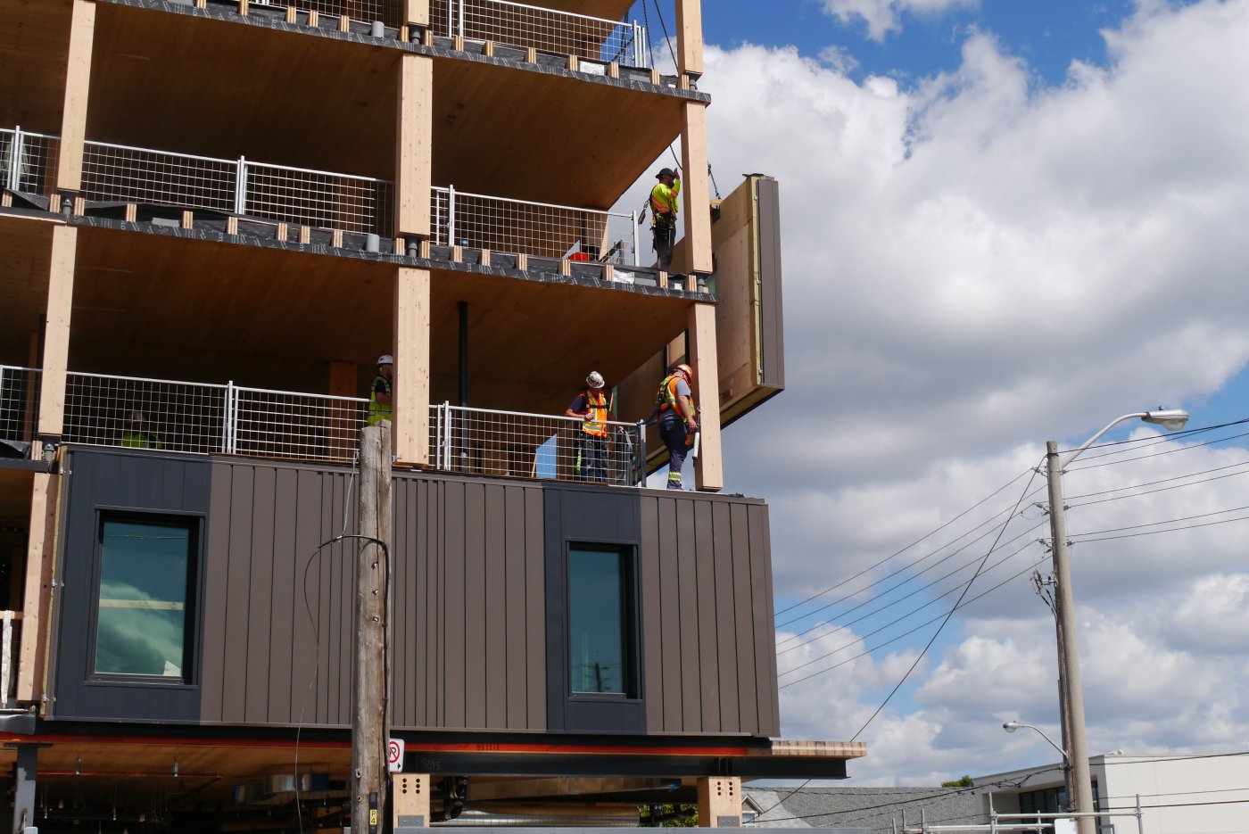 Wood, and time of wetness. Initial air and water tightness are measured on every job; how long the cladding stays wet, and when it starts to decay, is not.