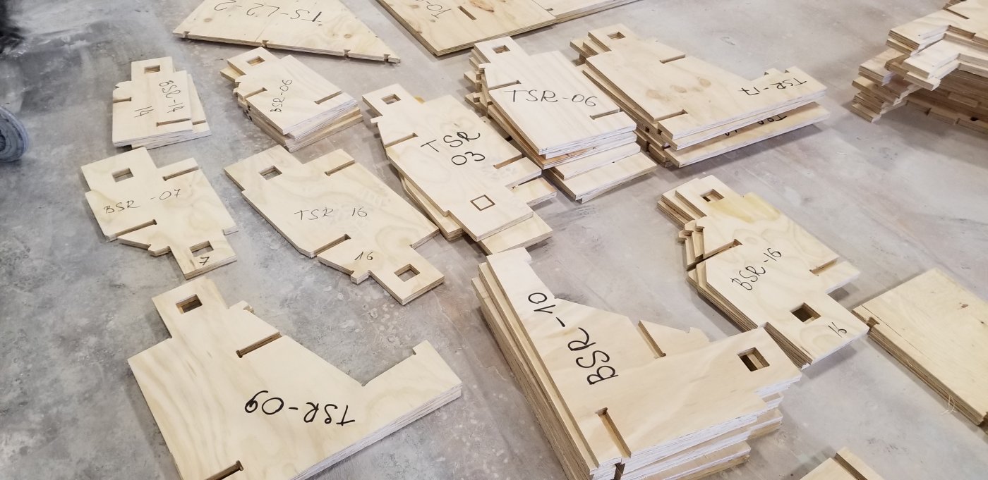 Cut, labelled, codified. A CNC machine cut every piece of formwork so the moulds could be adjusted incrementally between around 70 panel types.