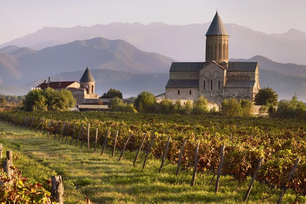 The richness a design has to read. Before proposing anything, Dijkema said, the practice studies a place's background and character: here the fortified villages and their towers, the mountainous landscape, and an ancient agriculture and wine tradition.