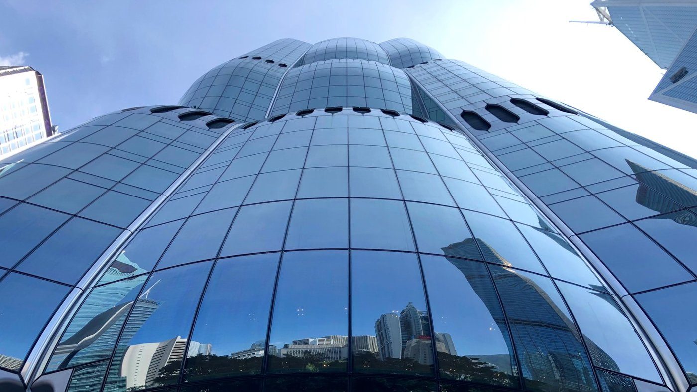 Double curvature at tower scale