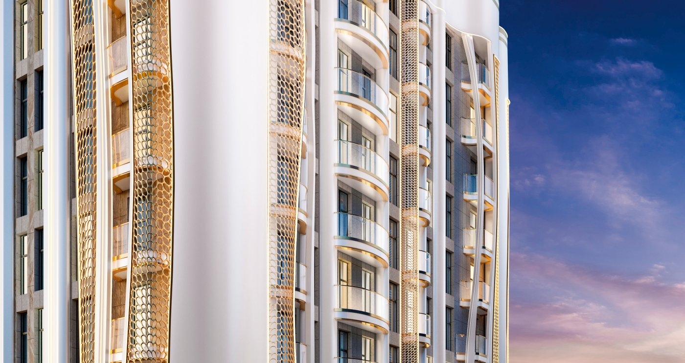 Curved white towers with bronze pierced screens running the full height between balconies