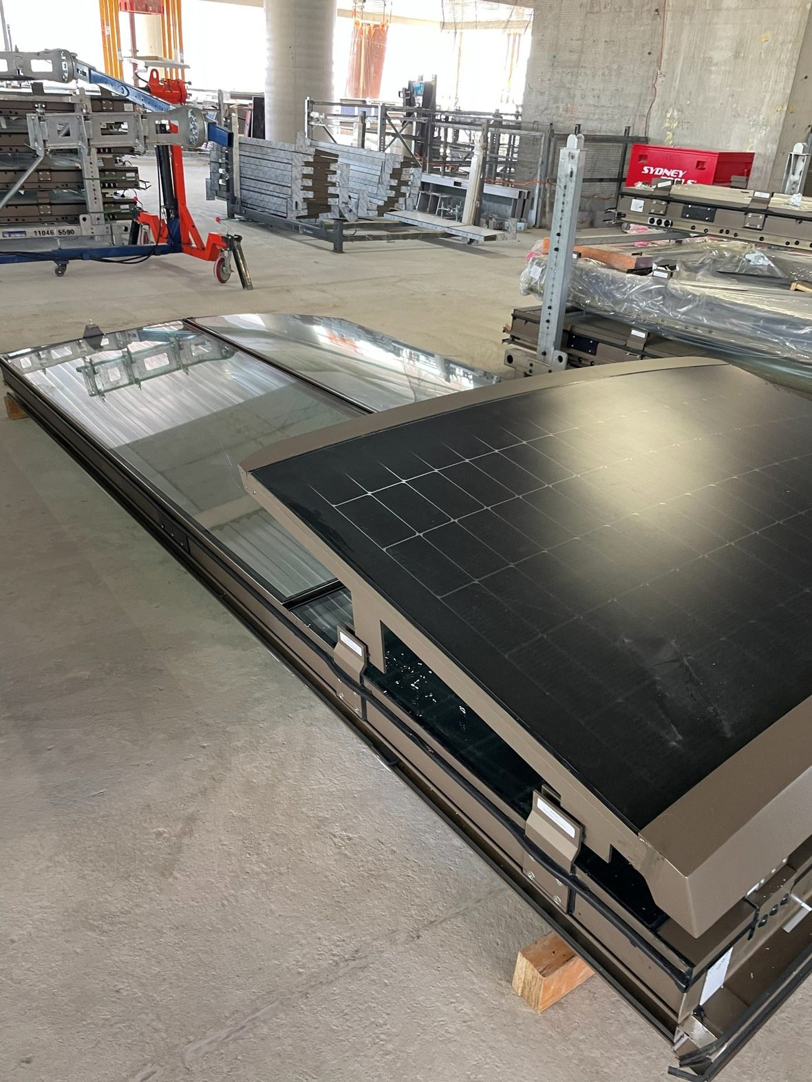 A photovoltaic façade panel in fabrication