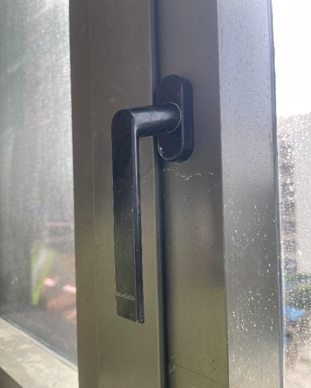 The openable window. Doshi explained how a German product was modified to give the narrowest possible groove while still opening to the ninety degrees the fire department requires.