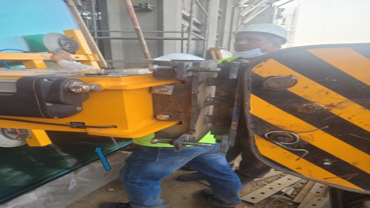 Turning half a tonne. The vacuum rig could rotate about two axes under remote control; the third had to be solved with a bracket made on site.