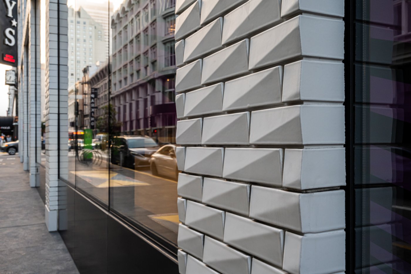 120 Stockton, San Francisco. A reclad of the old Macy's men's store, where Schwartz said the module graduates up the building from almost brick masonry to much larger extruded panels.