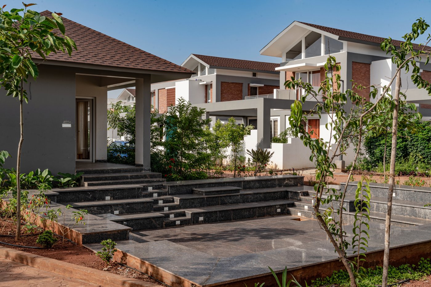 Stepped landscaped terraces forming social spaces