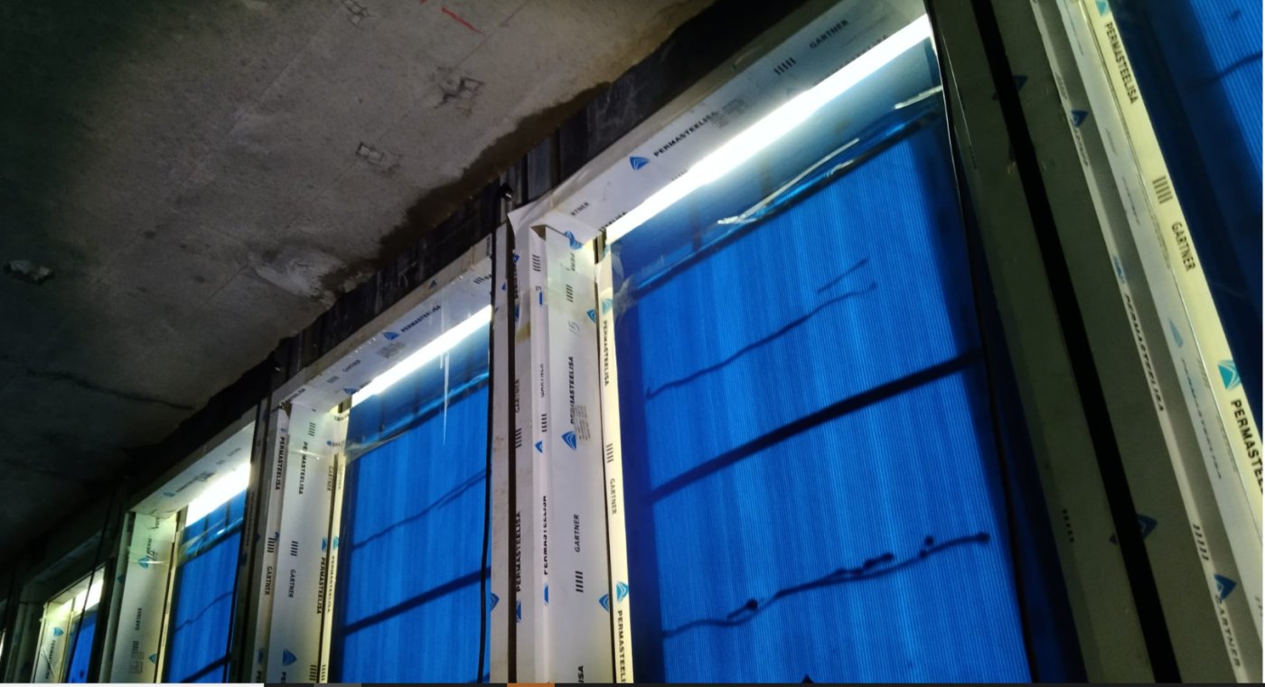 Then it has to survive the building. If waste is piled on every floor the installers cannot work cleanly; if it can be trolleyed to the edge and lifted out, far less damage is done.