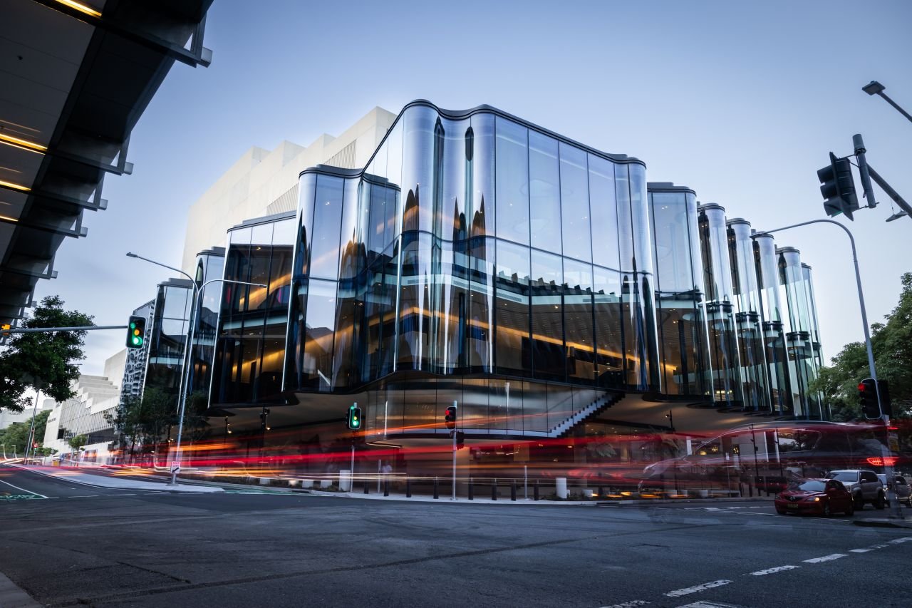 Brisbane’s new performing arts venue. Curved insulated units 7.5 metres tall, arc length 3.3 metres on a one-metre radius, made on a furnace NorthGlass built because none existed, and delivered in nine months.