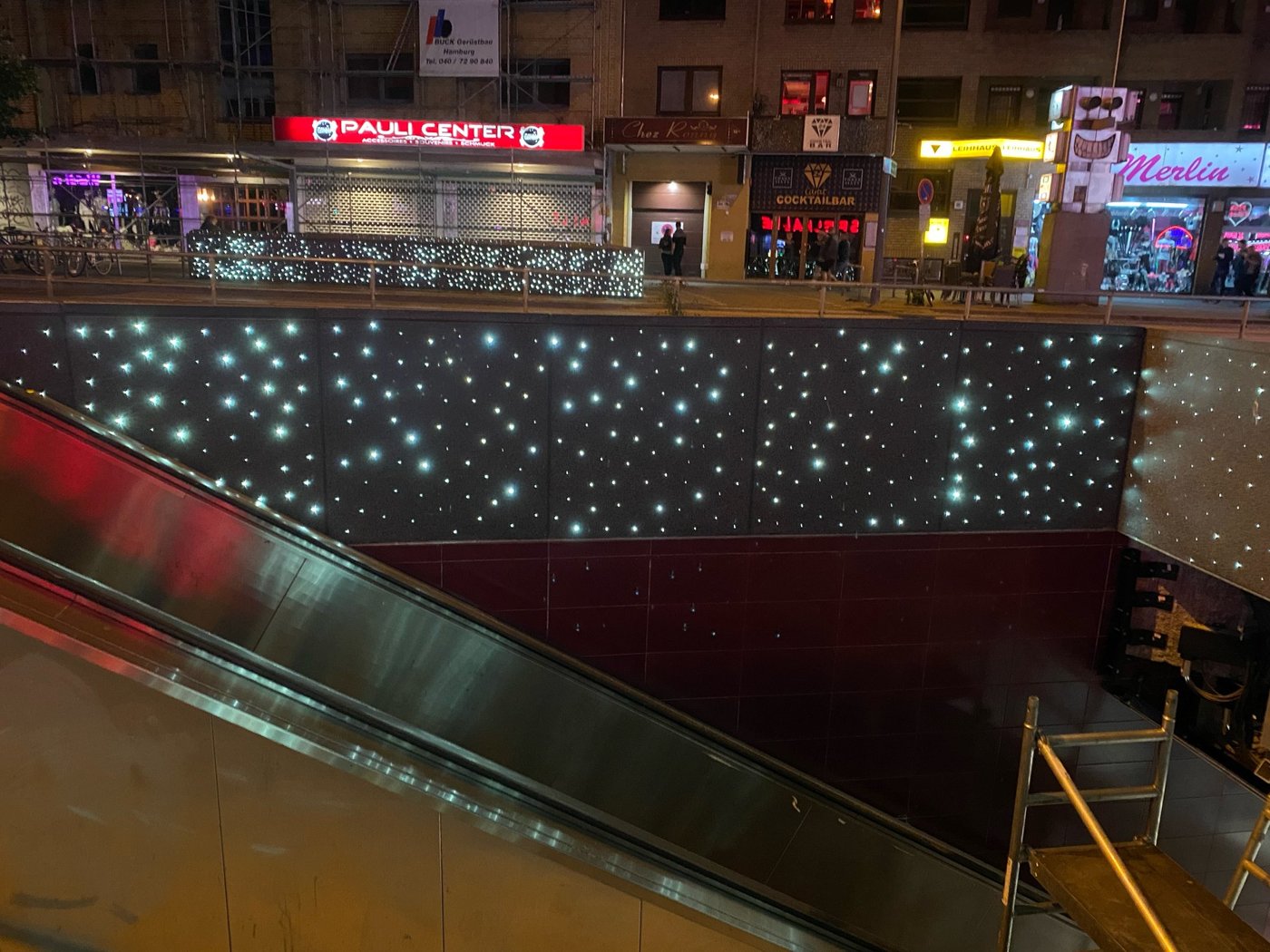 Illuminated concrete installation in a transport setting