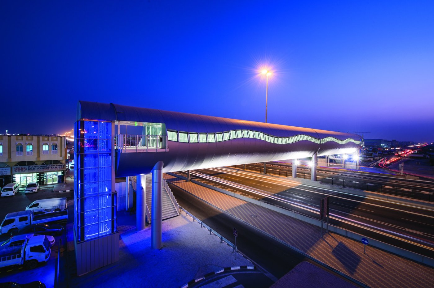 Illuminated aluminium-clad footbridge