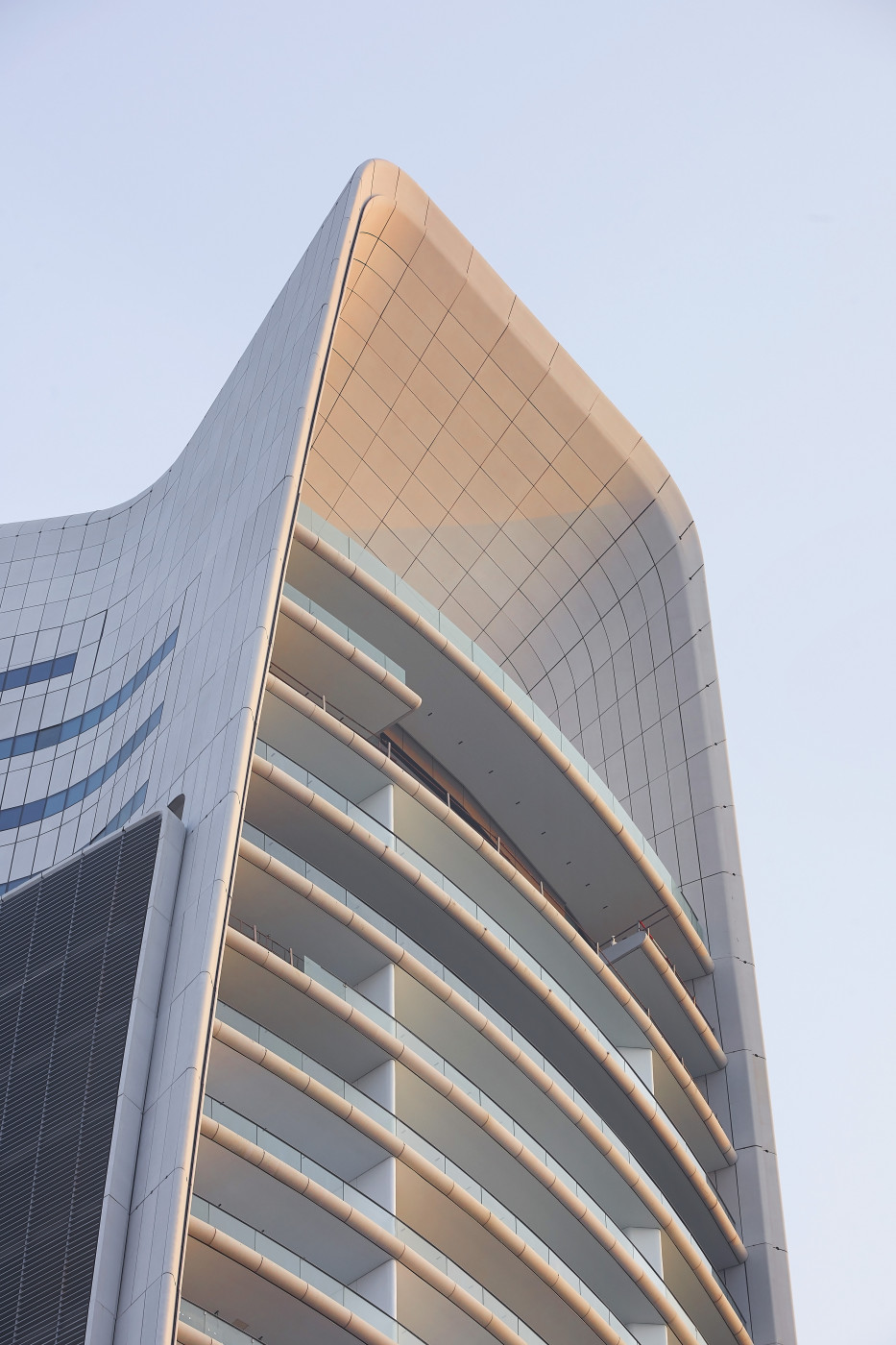 ONE. The same thinking at much larger scale, its shading and its depth becoming the identity of the building rather than a treatment applied to it.