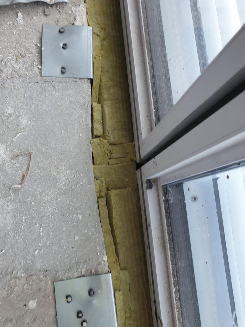 The joint fire uses first. The movement gap between slab and spandrel, which the façade needs in order to move and fire travels up if it is left open.