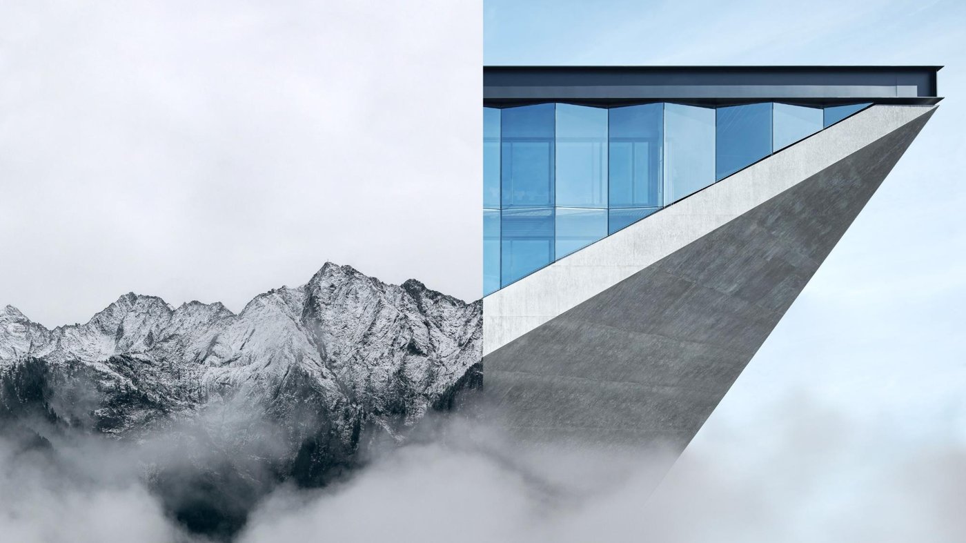 Cantilevered building above cloud