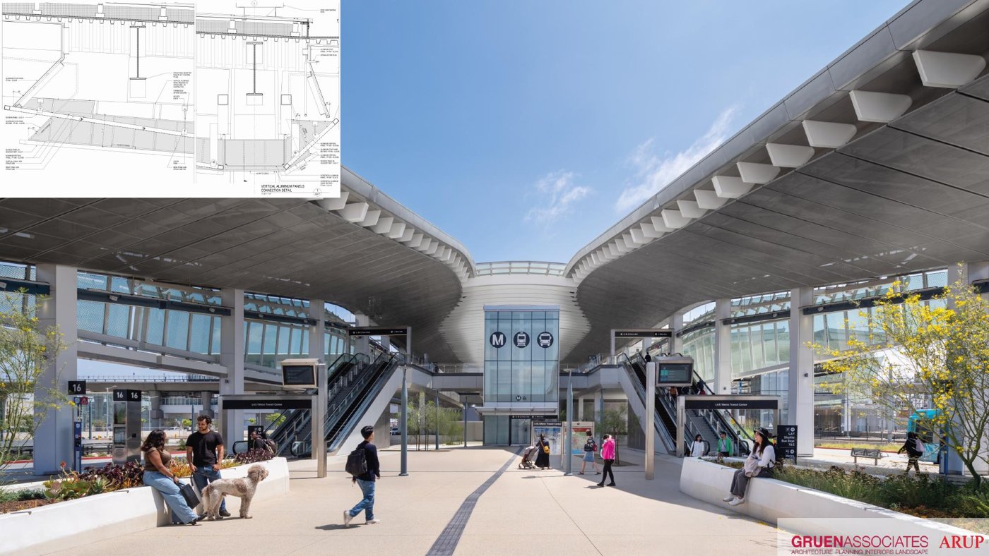 Daylit station concourse beneath curved roof ribbons with people moving through