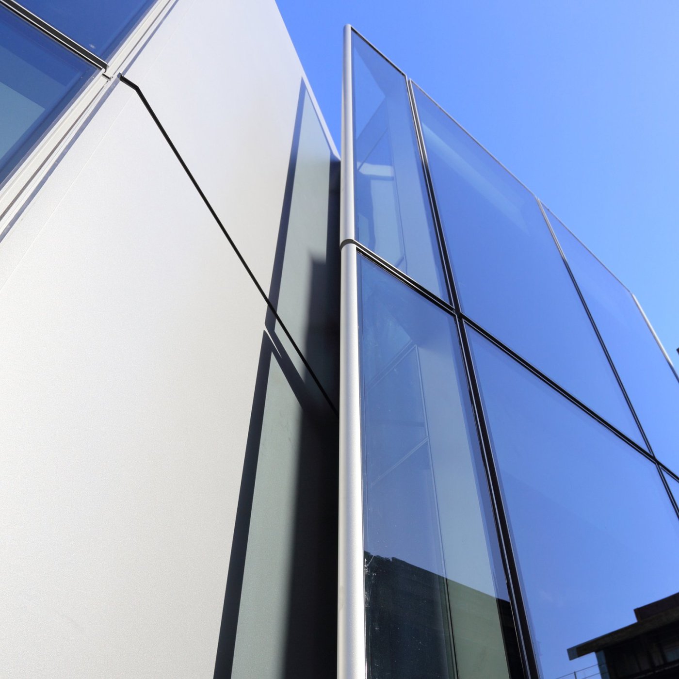Hiding the operable lights. Arianpour said the residential floors needed operable windows, so incisions were cut into the elevation to hold them: on a sleek glass tower he did not want opening lights varying up and down the façade.