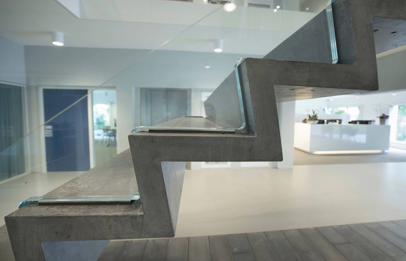 Hybrid glass-and-concrete stair