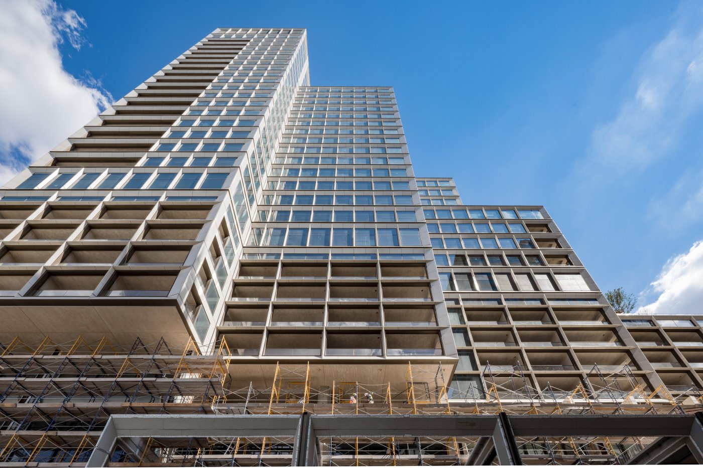 Limestone into terracotta. Brown said the hotel and condominium tower moves from Cordova cream limestone in cellular frames to glazed terracotta with bronze-coloured mullions.