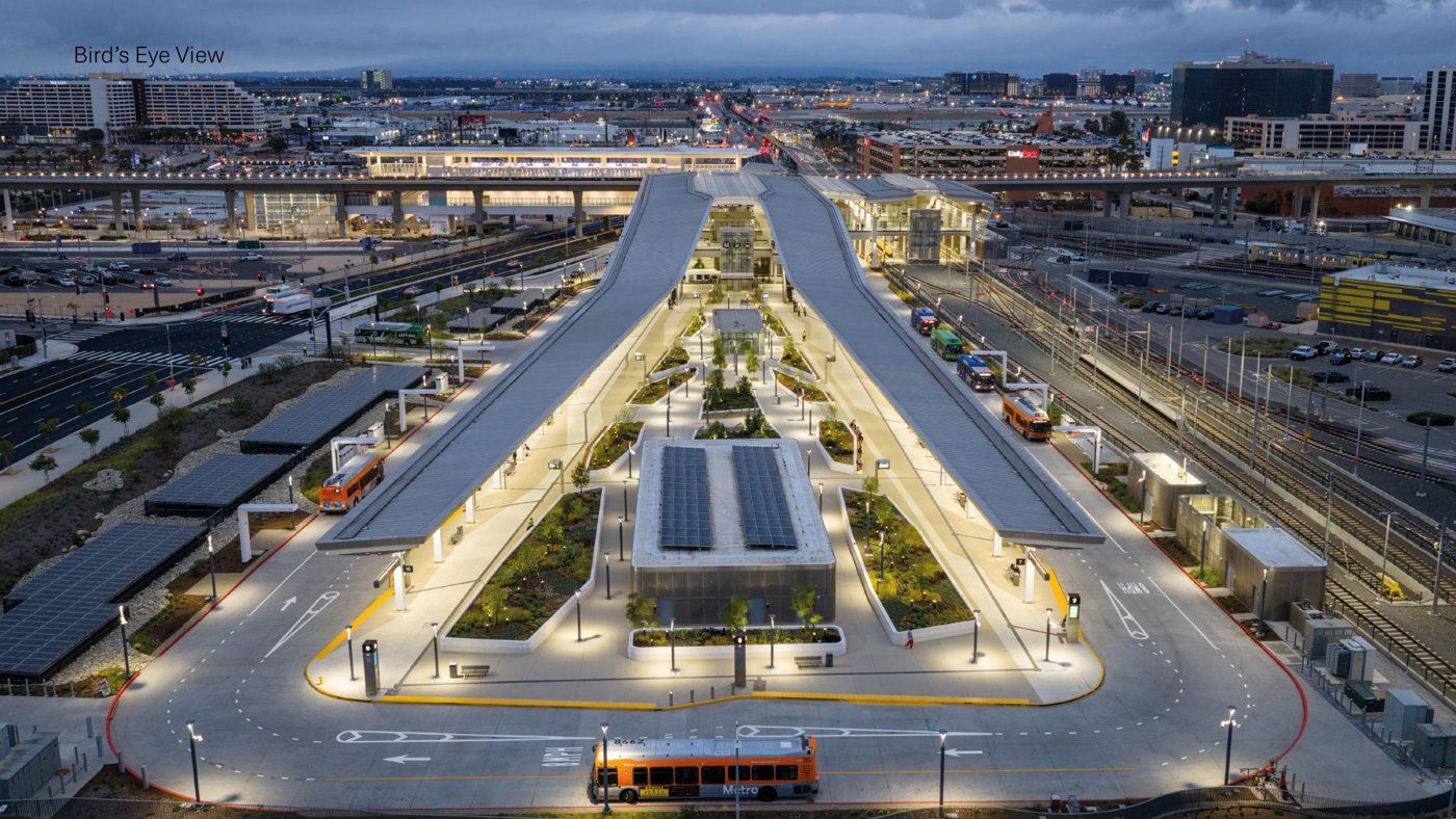 Aerial view of the transit centre and its landscaped setting among industrial surroundings