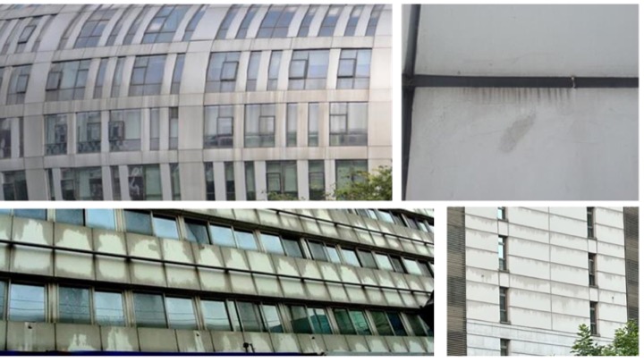 Weathered building façades showing staining