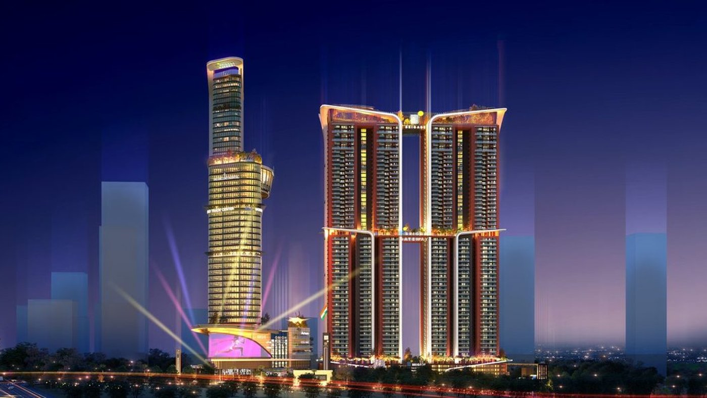 The towers of Brigade Gateway Neopolis at night