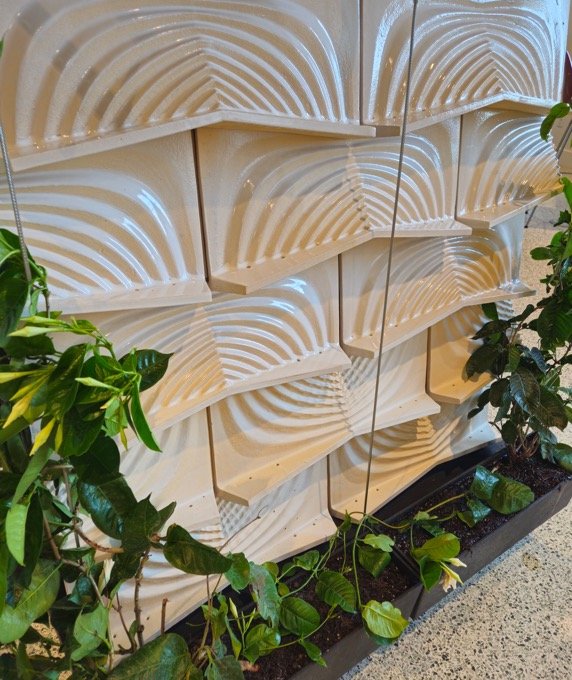 Cooled by the rain it caught. The module designed to test whether a terracotta façade could capture rainwater, slow it down and use it as a means of cooling itself.
