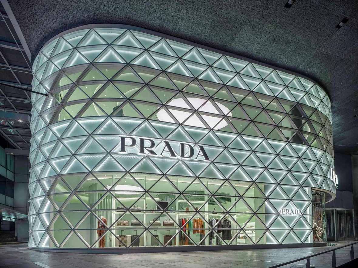 Prada Singapore diamond-grid glass façade at night
